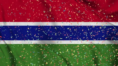 Gambia flag seamless animation with fireworks Stock Footage 223321353