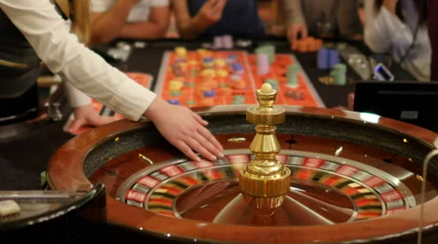 Gamble players at casino, gambling roulette poker game table Stock Footage