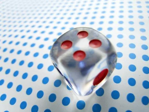 Gamblig dice on blue dotted background 스톡 사진