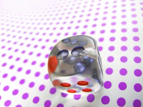 Gamblig dice on doted background 스톡 사진