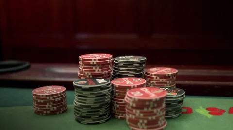 Gambling chips decreasing at a gambling table. Video stock 51851053
