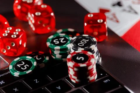 Gambling chips with dices close-up Stock Photos