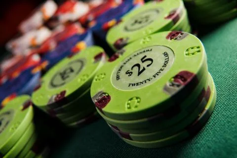 Gambling chips on a gaming table Stock Photos