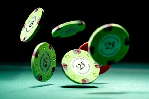 Gambling chips on a gaming table Stock Photos