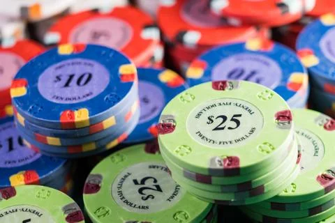 Gambling chips on a gaming table Stock Photos