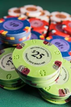 Gambling chips on a gaming table Stock Photos