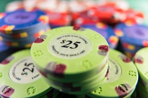 Gambling chips on a gaming table Stock Photos