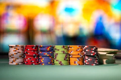 Gambling chips on a gaming table Stock Photos