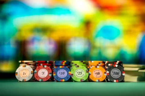 Gambling chips on a gaming table Stock Photos