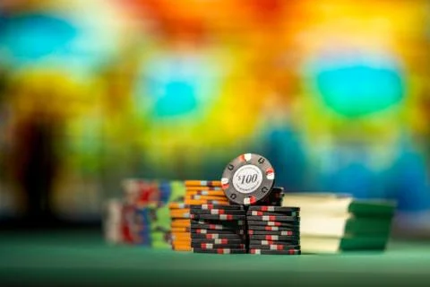 Gambling chips on a gaming table Stock Photos