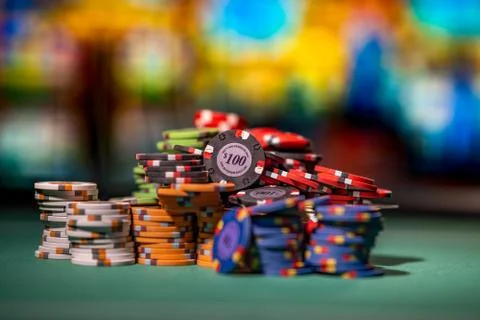 Gambling chips on a gaming table Stock Photos
