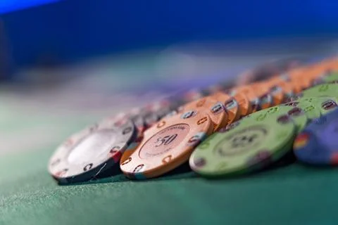 Gambling chips on a gaming table Stock Photos