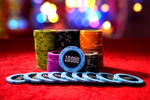 Gambling chips on a gaming table Stock Photos
