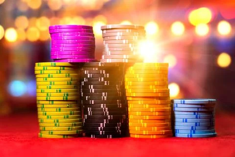 Gambling chips on a gaming table Stock Photos