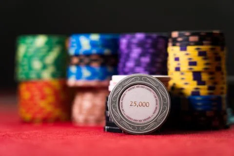 Gambling chips on a gaming table Stock Photos