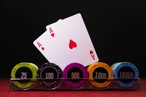 Gambling chips on a gaming table Stock Photos