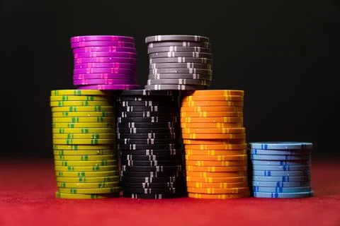 Gambling chips on a gaming table Stock Photos