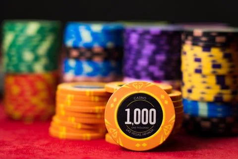 Gambling chips on a gaming table Stock Photos
