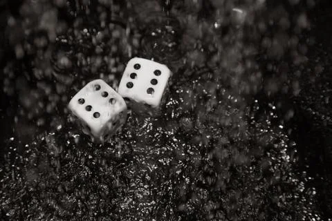 Gambling dices under the rain Stock Photos