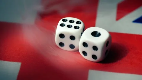 Gambling dices on the Union Jack Flag Stock Footage 302840260