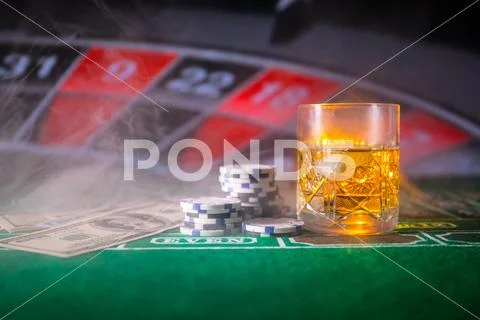 Gambling, fortune, game and entertainment concept - close up of casino chips Stock Photos