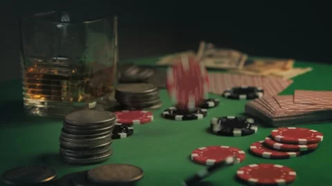 Gambling fortune. Poker chips falling on casino table in slow motion. Gambling Stock Footage 138981900