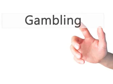 Gambling - Hand pressing a button on blurred background concept on visual scr Stock Photos