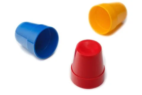 Gambling in thimbles. Isolate on white background Stock Photos