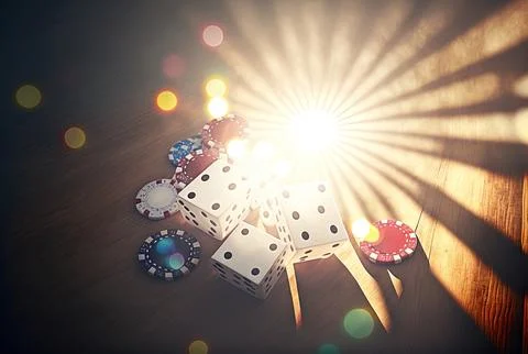 Gambling a white wooden table with a dice, poker chips, and cards adjacent. sun Stock Illustration