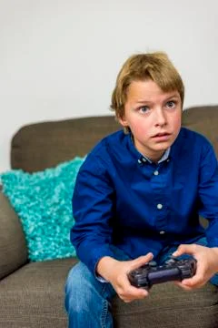 Game addicted boy Stock Photos