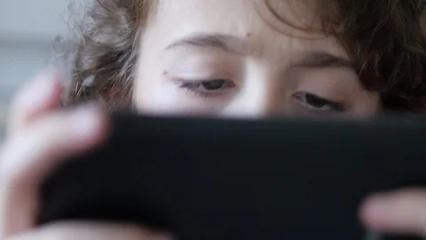 Game addicted. Child playing on tablet. Stock Footage 102587902