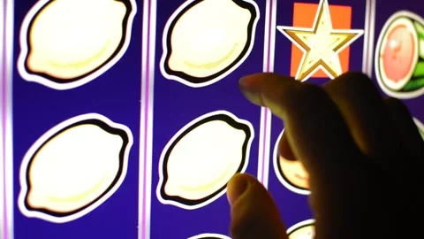 Game addicted play with slot machine in a casino. slot machine jackpot. Vídeo Stock 233680425