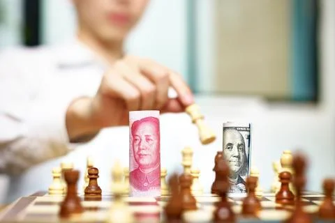 A game between CNY and USD Stock Photos