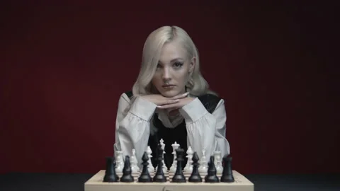 Game of chess. Blonde. Retro hairstyle. Stock Footage 238778024