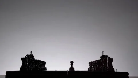 Game of chess. Chessboard with chess pieces silhouettes Stock Footage 148173175