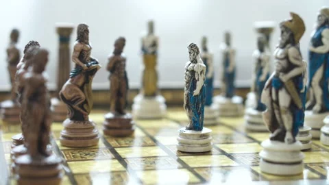 Game of Chess. Man's hand makes a move with a knight against an opponent's piece Stock Footage 198677485