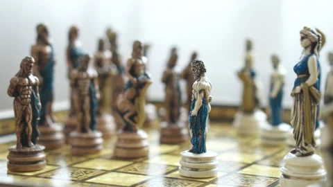 Game of Chess. Man's hand makes a move with a knight against an opponent's piece Stock Footage 204128994