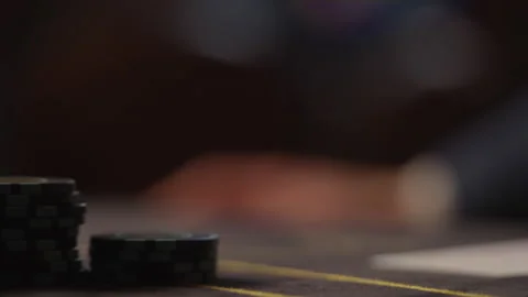 Game chips on the poker table. Game night at the casino Stock Footage 273034235