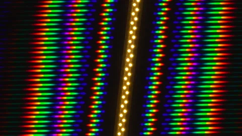 Game of color highlights, image of light diffraction from a line of LEDs Stock Footage 149590711