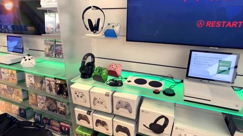 Game consoles and accessories in Microsoft store in 5th avenue in Manhattan Stock Footage 98228486