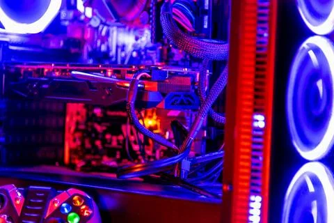 Game controller and desktop computer with RGB lights Stock Photos