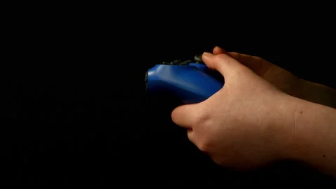 Game controller being used on black background pt 5 of 10 Stock Footage 149637788
