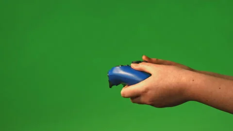 Game controller being used on green screen pt 2 of 4 Stock Footage 149643306