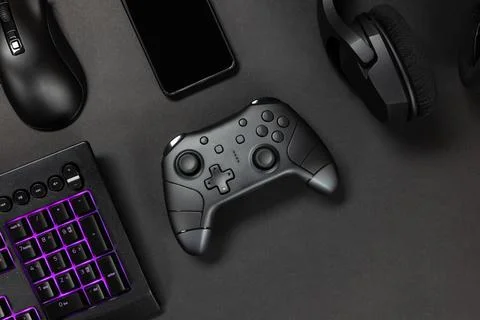 Game controller with gadgets and smartphone Stock Photos