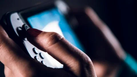 Game controller in the hands, close up 스톡 사진