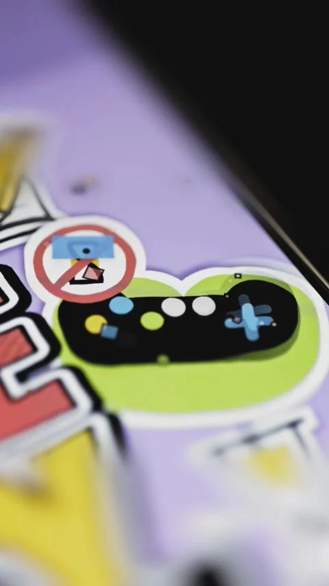 Game controller sits beside crossed device restriction symbol Stock Footage 346609024