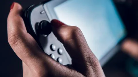 Game controller in the woman hands 스톡 사진
