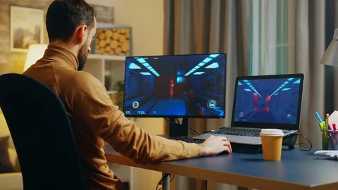 Game creator testing the game over level interface Stock Footage 125125354