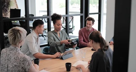 Game designers discussing VR headset technology Stock-Footage 112062592