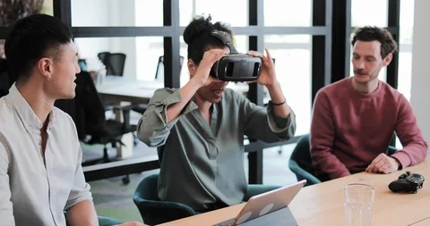 Game designers testing a new VR game Stock Footage 112077321